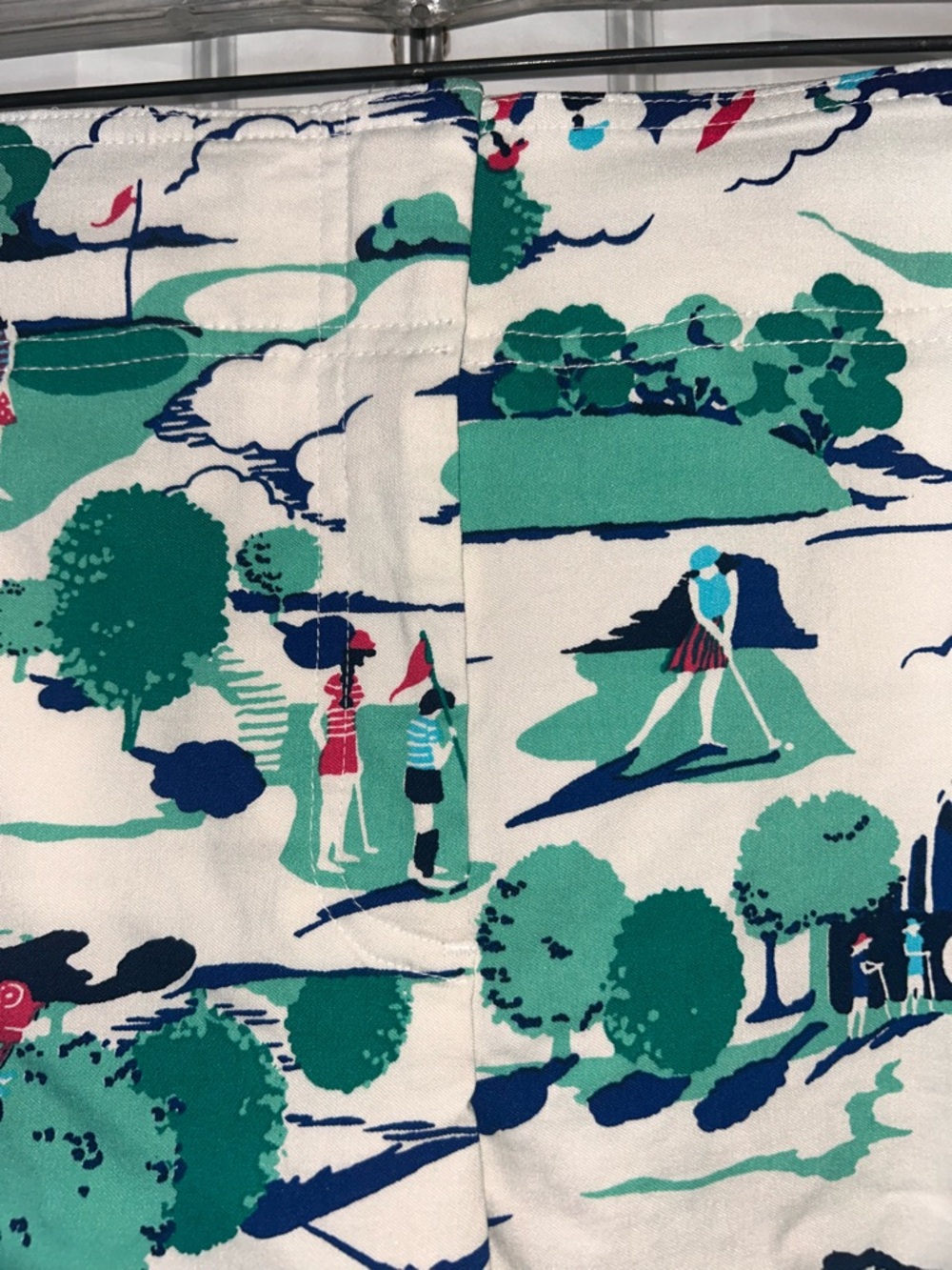Izod White Golf-Scene Print Skort with Green and Navy Accents - Picture 2 of 6